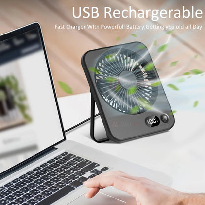 fan next to laptop
